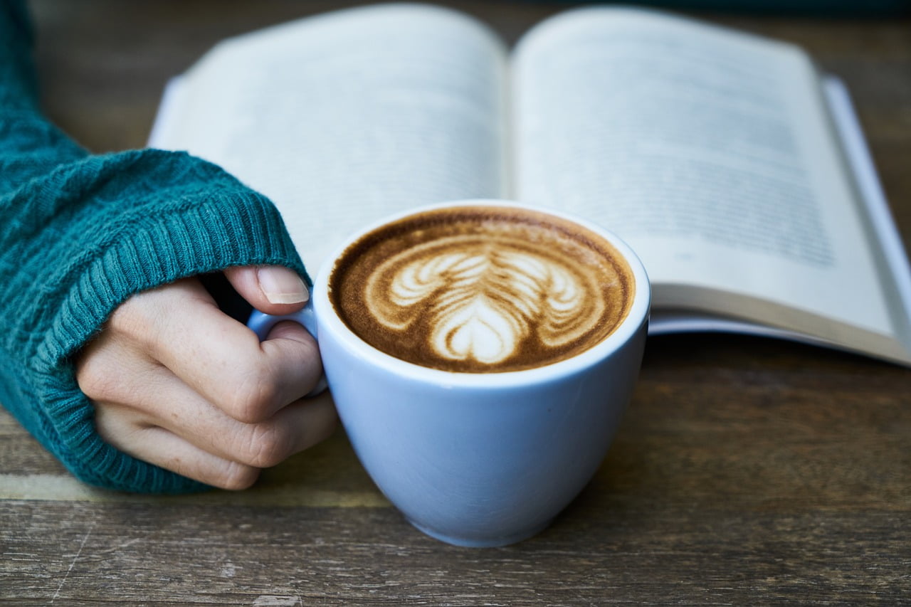 coffee drinking and reading a book